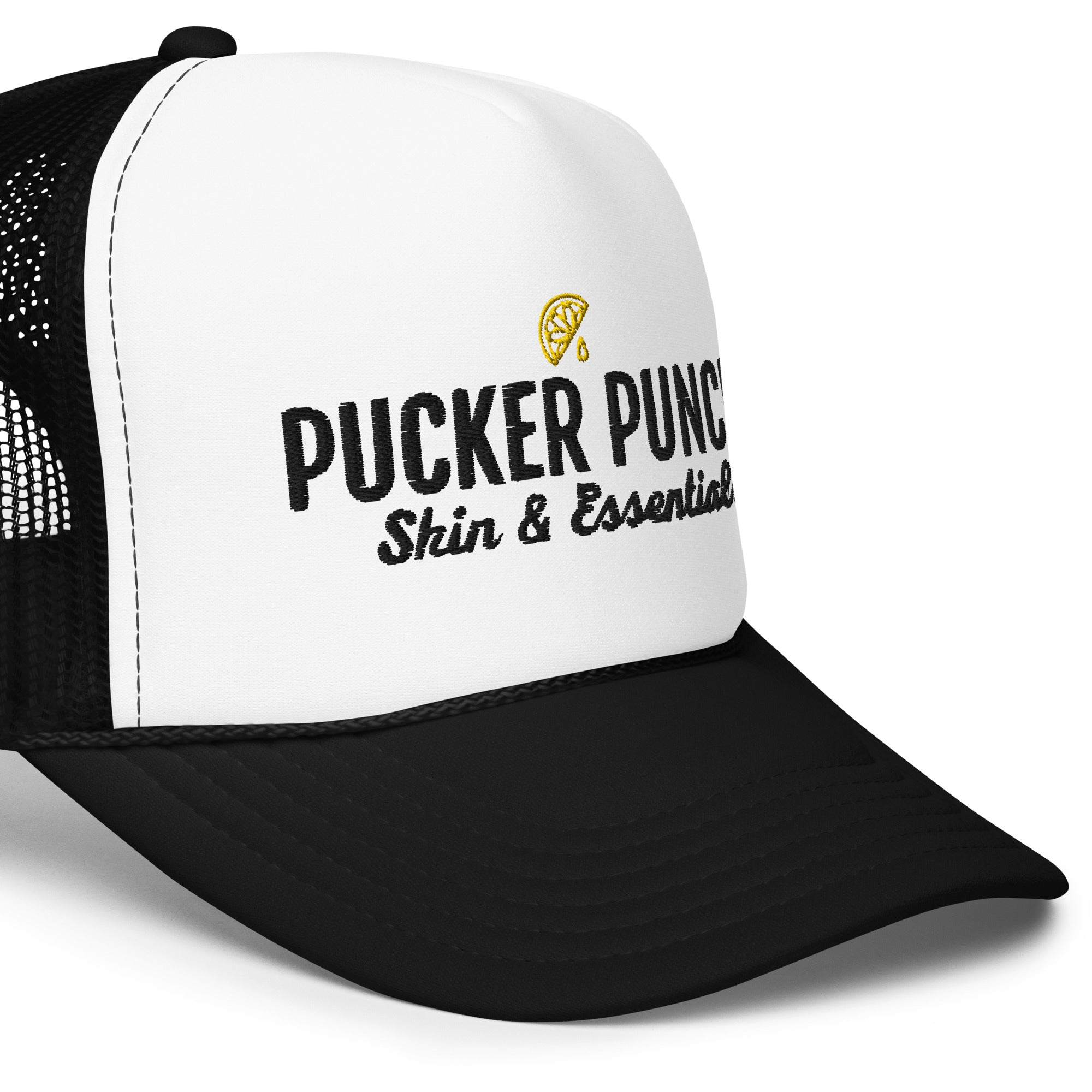 https://puckerpunch-essentials.com/cdn/shop/products/foam-trucker-hat-black-white-black-one-size-product-details-2-640b8b25ba61d_1024x1024@2x.jpg?v=1678478138